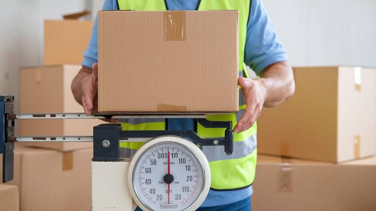 Image of a package being weighed